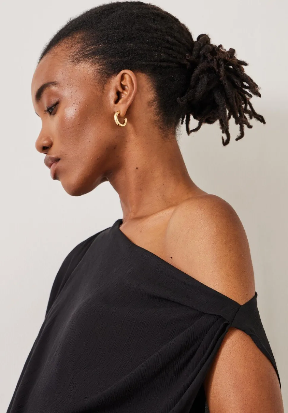 Grace Asymmetric Top